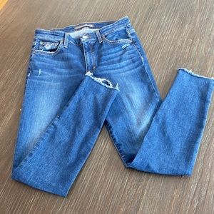 Joe’s jeans with some distressing, medium rise ankle cut.  Size 26.